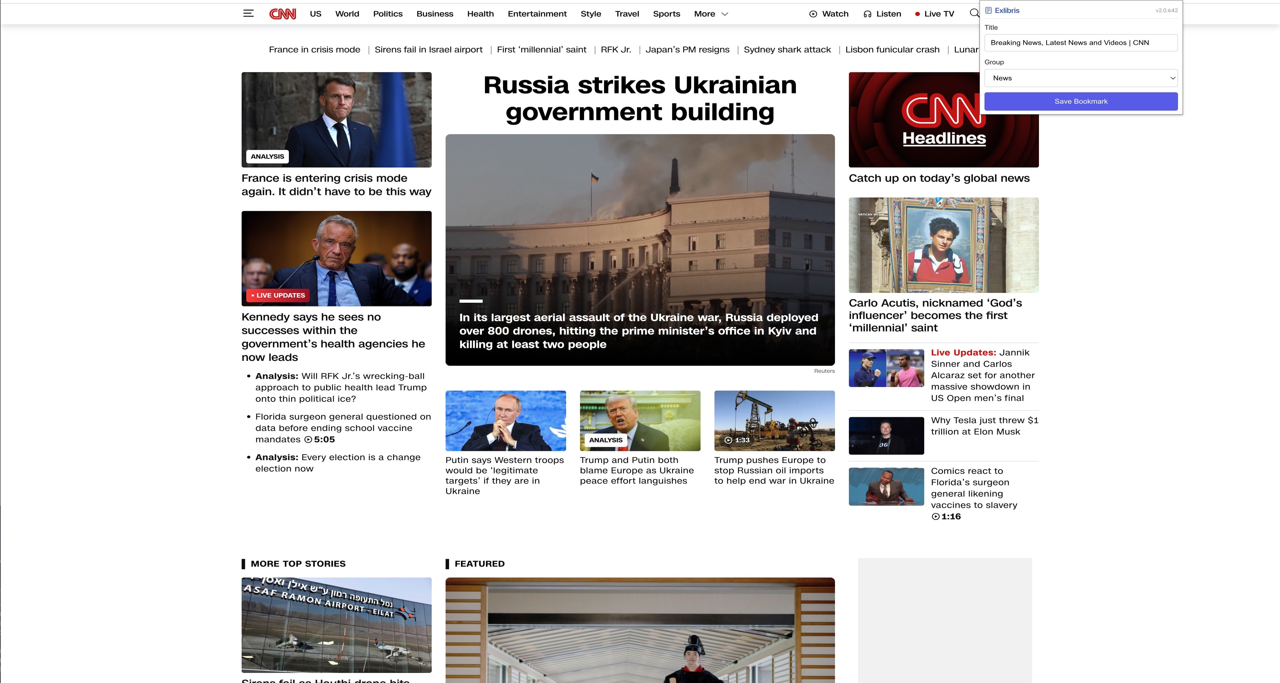 CNN website with ExLibris extension showing save bookmark button in action